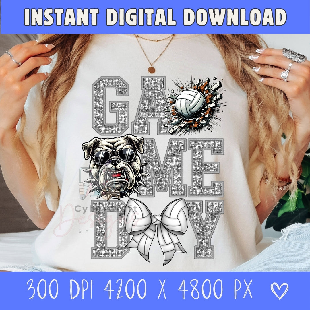 A woman wearing a white graphic t-shirt with a 'GAME A GAME DAY' design featuring a bulldog, volleyball, and bow tie in a glittery silver style. The image includes a blue banner at the top and bottom with text 'INSTANT DIGITAL DOWNLOAD' and print size details.