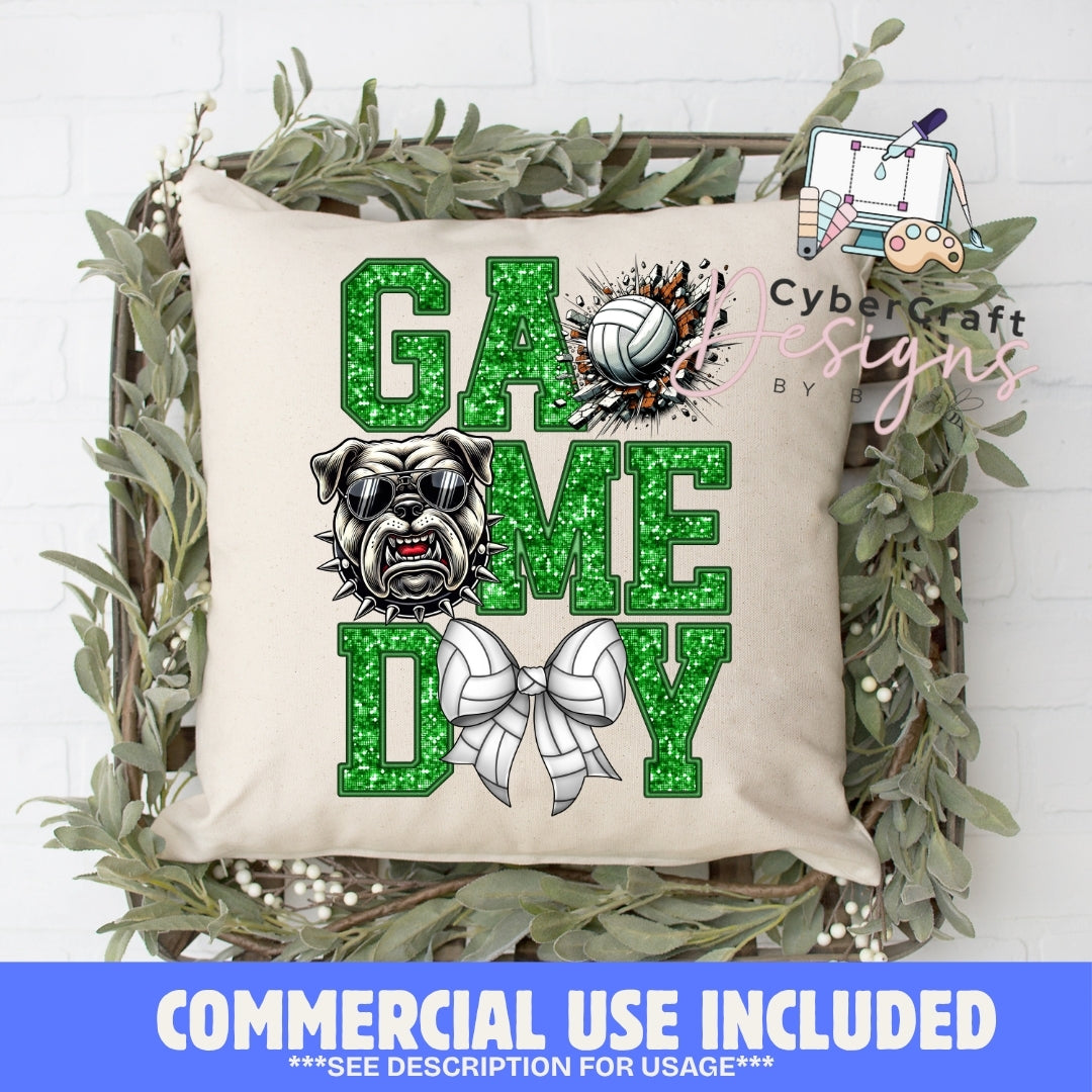 A square beige throw pillow with a green glitter-textured 'GAME DAY' design, featuring a bulldog graphic and volleyball/bow motifs, displayed in a decorative wreath on a white brick wall. A blue banner at the bottom reads 'COMMERCIAL USE INCLUDED' and a 'Cybercraft designs' watermark appears on the right.