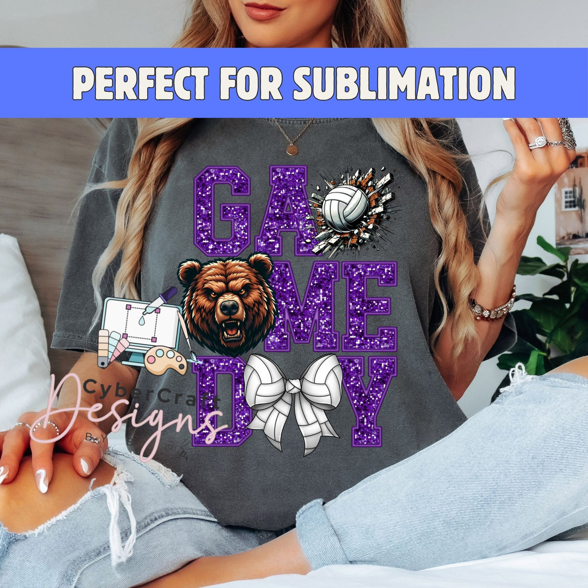 A woman wearing a dark gray t-shirt with a purple glittery 'GAME DAY' graphic featuring a bear head, volleyball, and cheerleader bow. A blue banner at the top reads 'PERFECT FOR SUBLIMATION' and a watermark 'CyberCraft Designs' is visible.