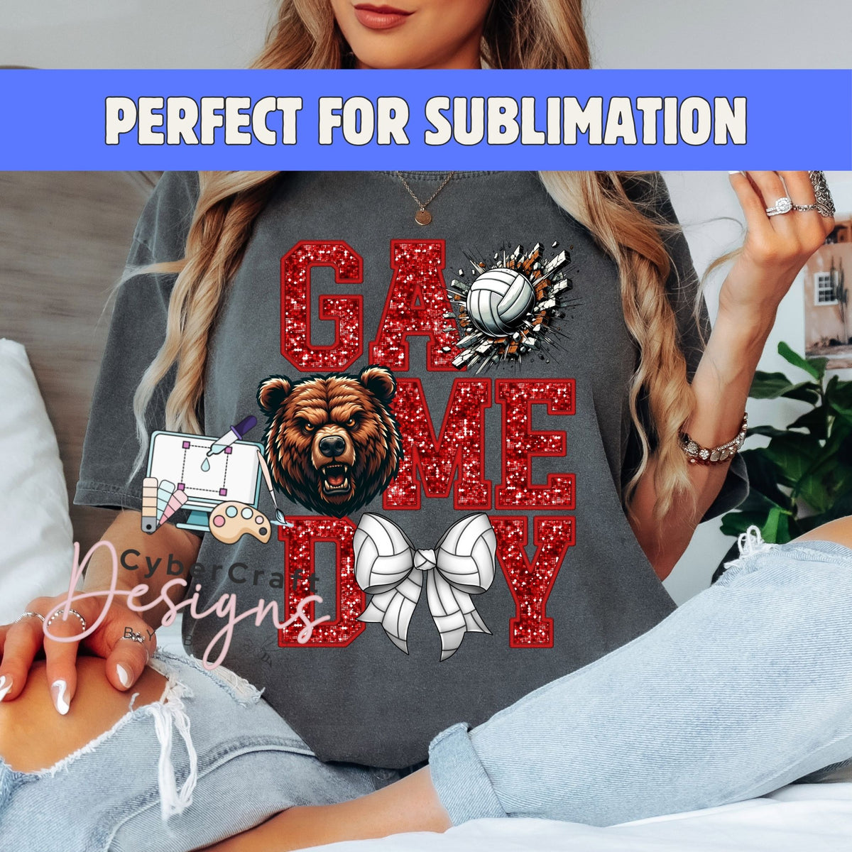 A woman wearing a dark gray graphic t-shirt with a red glittery 'GAME DAY' design featuring a bear head, volleyball, and white bow. A blue banner at the top reads 'PERFECT FOR SUBLIIMATION' and a watermark 'CyberCraft Designs' is visible.