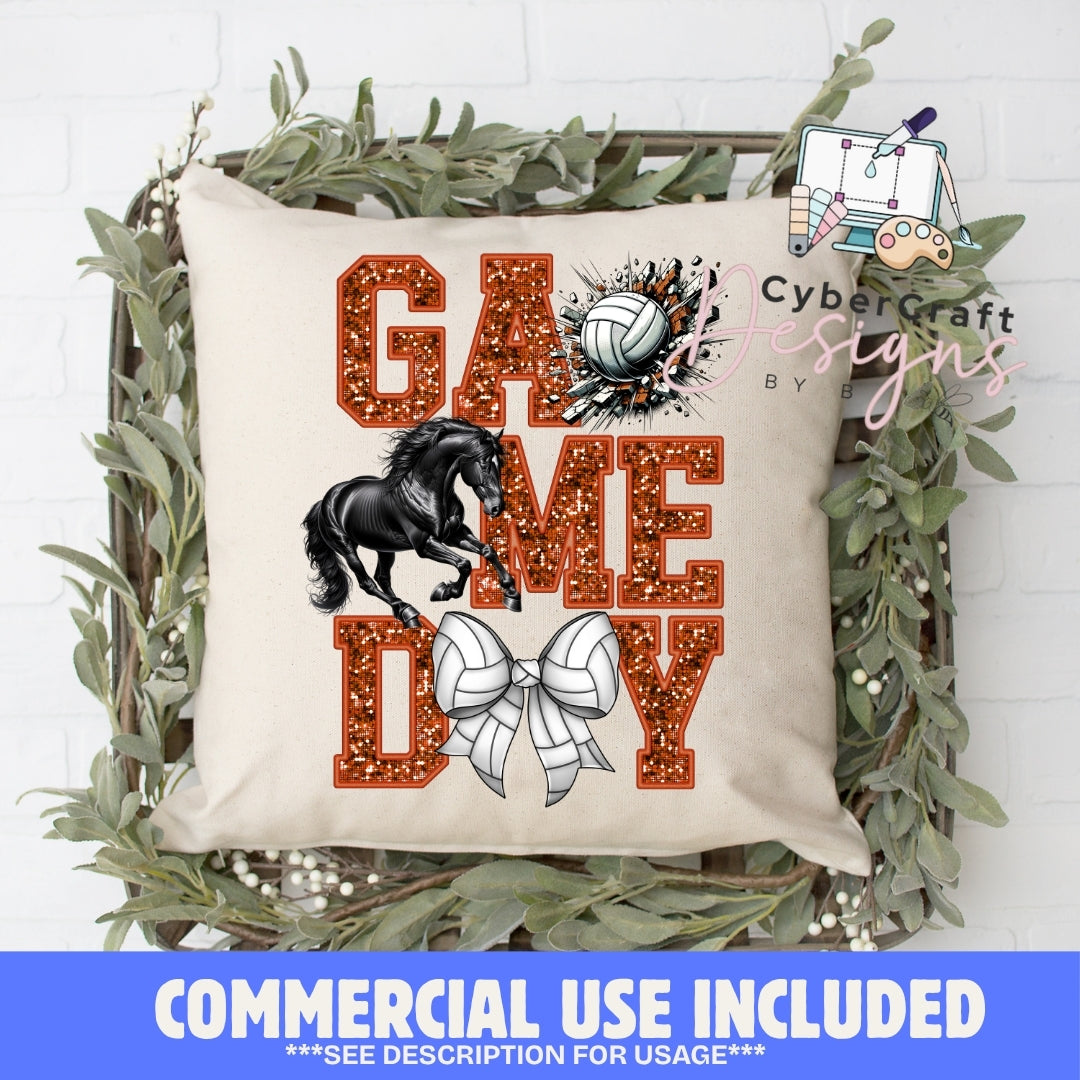 A square decorative throw pillow displayed in a rustic wooden crate with greenery, featuring a 'Game Day' graphic with glitter-textured orange letters, a black horse, a volleyball, and a white volleyball bow. A blue banner at the bottom reads 'COMMERCIAL USE INCLUDED'.