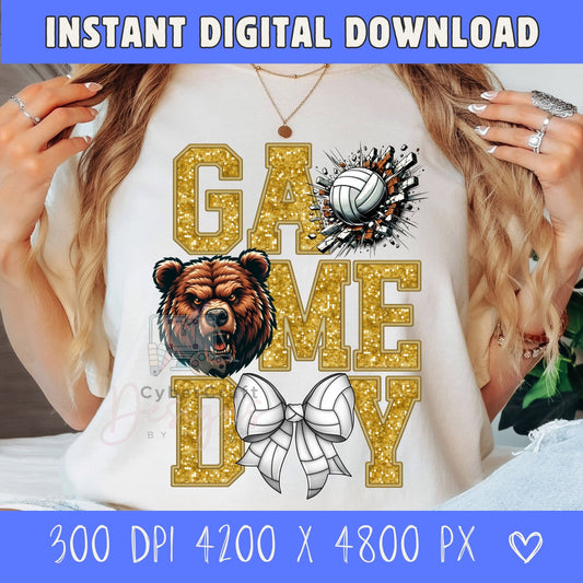 A woman wearing a white graphic t-shirt with a 'GAME DAY' design featuring a glittery gold font, a brown grizzly bear illustration, a volleyball, and a white bow. The image includes blue banners at the top and bottom with text 'INSTANT DIGITAL DOWNLOAD' and size details.