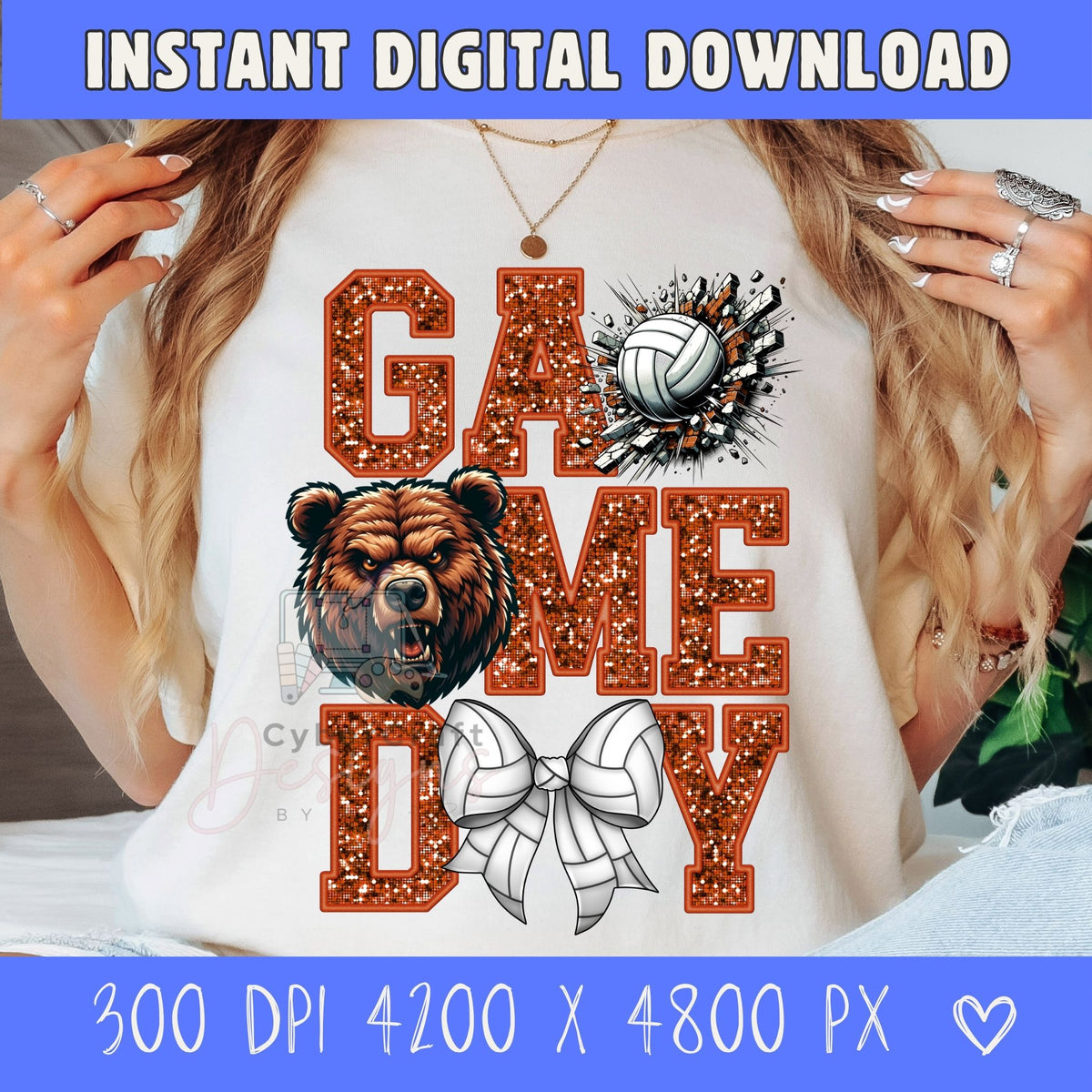 A woman wearing a white graphic t-shirt with a 'GAME ME DAY' design featuring glittery orange letters, a brown bear graphic, a volleyball, and a white ribbon bow. The image includes digital mockup overlays and text banners for digital download.