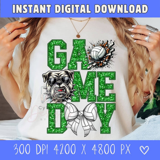 A woman wearing a white graphic t-shirt featuring a green glitter-textured 'GAME DAY' design with a bulldog, volleyball, and cheerleader bow. The image includes a blue banner at the top and bottom with text reading 'INSTANT DIGITAL DOWNLOAD' and '300 DPI 4200 X 4800 PX'.