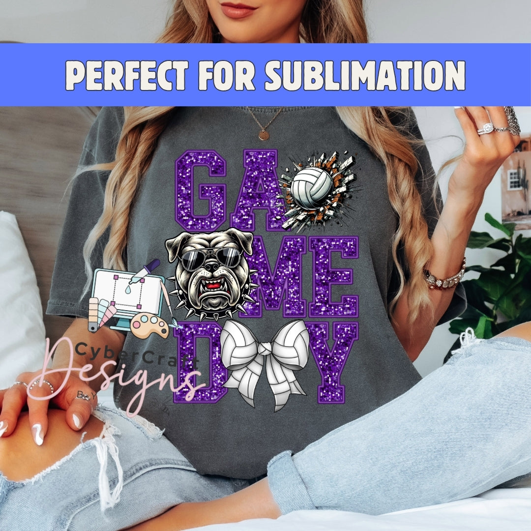 A woman wearing a dark gray t-shirt with a purple glittery 'GAME DAY' graphic featuring a bulldog, volleyball, and cheerleader bow tie. A blue banner at the top reads 'PERFECT FOR SUBLIMATION' and a watermark 'CyberCraft Designs' is visible.