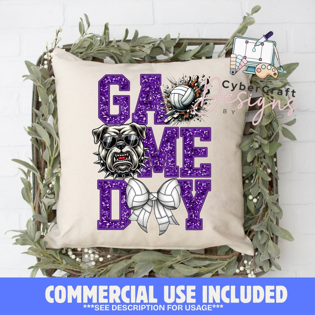 A square beige throw pillow with a 'GAME TIME' graphic featuring a bulldog wearing sunglasses, a volleyball, and a ribbon bow in purple glitter-style lettering. The pillow is displayed in a rustic wooden basket with green foliage, with a 'Cybercraft designs' watermark and a 'COMMERCIAL USE INCLUDED' banner at the bottom.