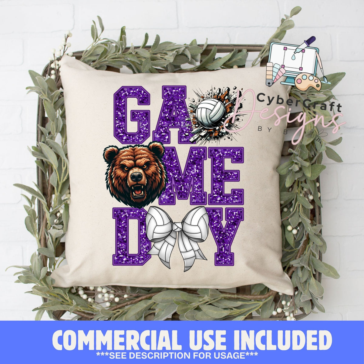 A square beige throw pillow with a 'Game Day' volleyball graphic, styled in a decorative wooden basket with green foliage. The graphic features purple glitter-textured letters, a brown bear illustration, and a white volleyball.