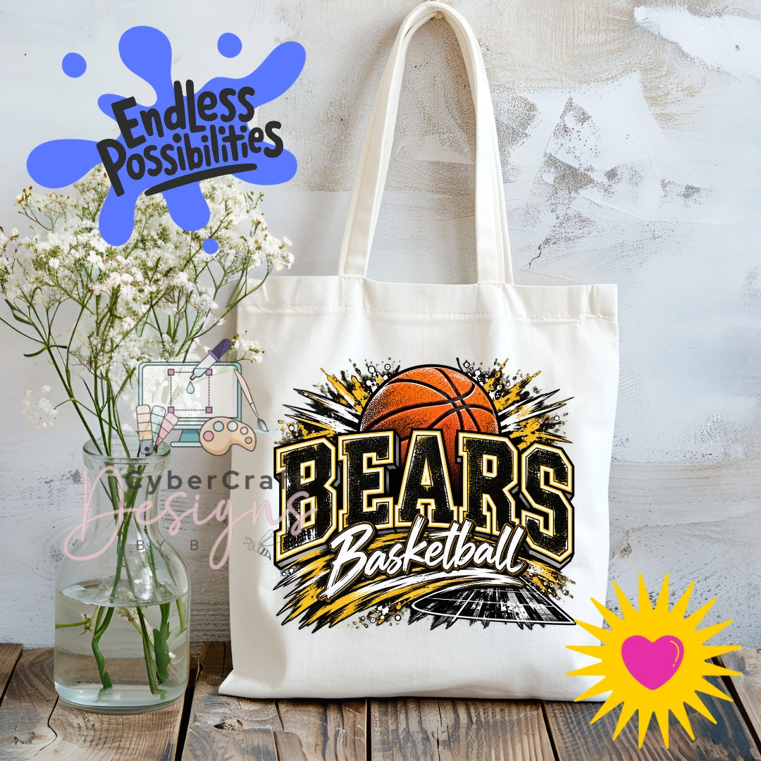 Black and gold Bears Basketball varsity PNG graphic printed on a cream canvas tote bag, showcasing an orange basketball, distressed school spirit lettering, and dynamic paint splashes.