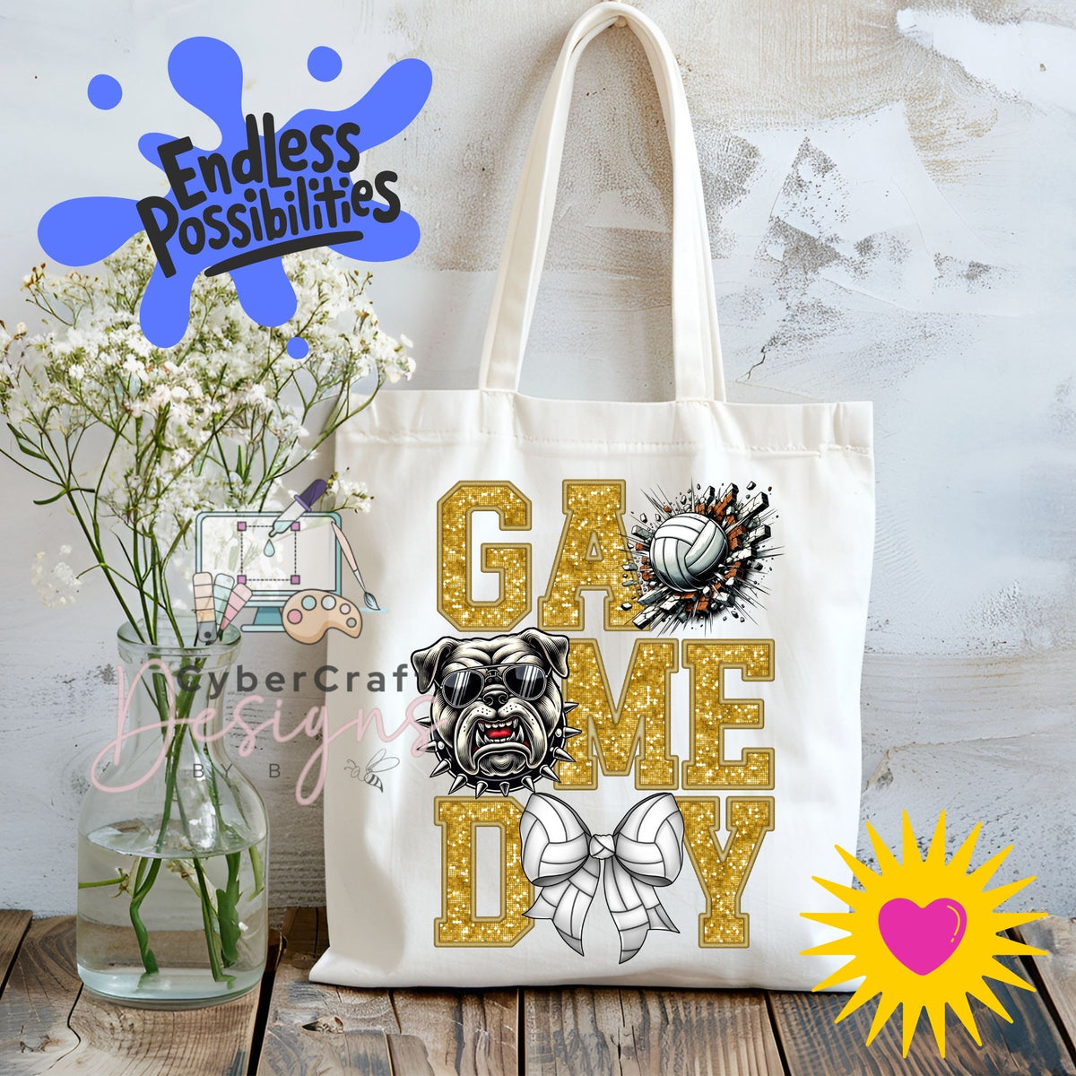 A white canvas tote bag with 'GAME DAY' printed in glittery gold letters, featuring a bulldog graphic and a volleyball design. The bag is displayed on a rustic wooden table next to a glass vase of baby's breath, with decorative digital overlays including 'Endless Possibilities' and 'CyberCraft Designs'.