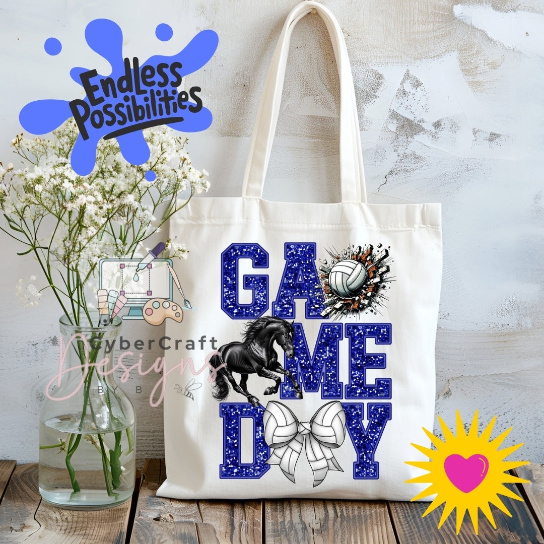 A cream canvas tote bag with a 'GAME DAY' graphic featuring blue glitter-textured letters, a black horse, a white bow, and a volleyball. The bag is displayed on a rustic wooden table next to a glass vase of white flowers, with decorative digital overlays including 'Endless Possibilities' and 'CyberCraft Designs'.