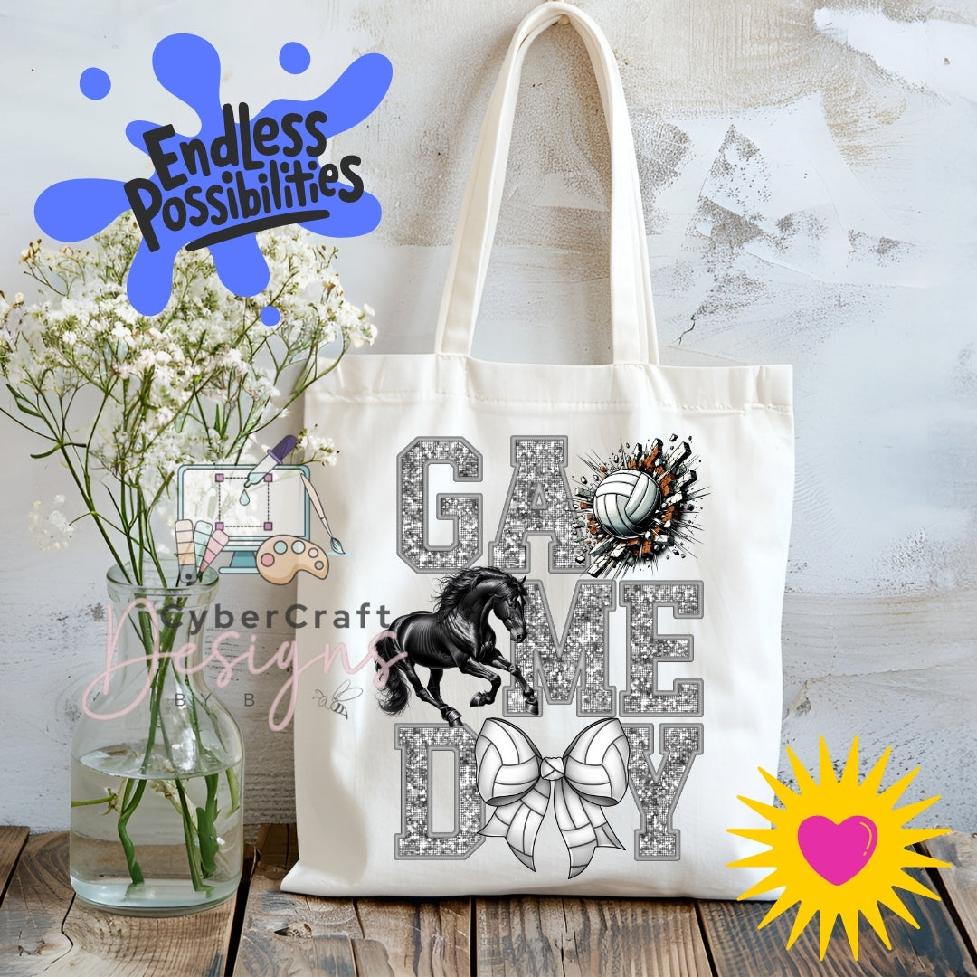 A white canvas tote bag with a 'Game Me Day' graphic featuring a black horse, white bow, and volleyball design, displayed on a rustic wooden table next to a vase of white flowers with decorative overlays.